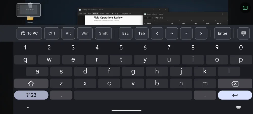 The phone's keyboard with a row of PC keys above it: To PC, Ctrl, Alt, Win, Shift, Esc, Tab, the arrows and Enter.
