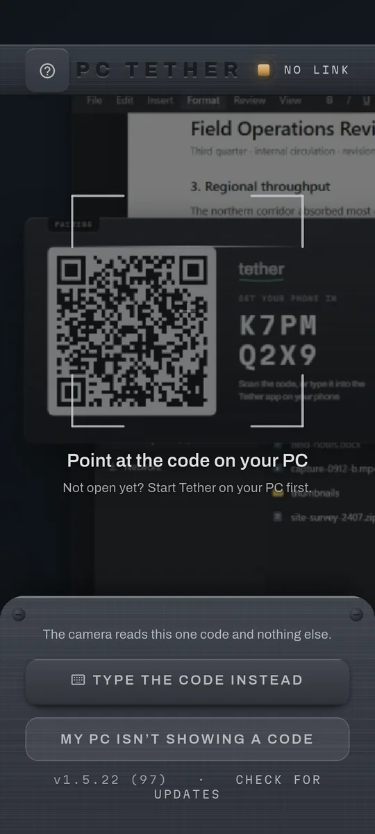 The PC Tether pairing screen, its camera aimed at the code a PC is showing.